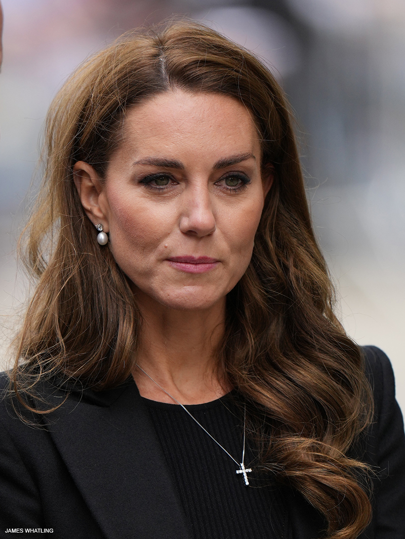 The Princess of Wales—Kate Middleton—wearing the late Queen's pearl earrings and a diamond cross necklace in Sandringham today.