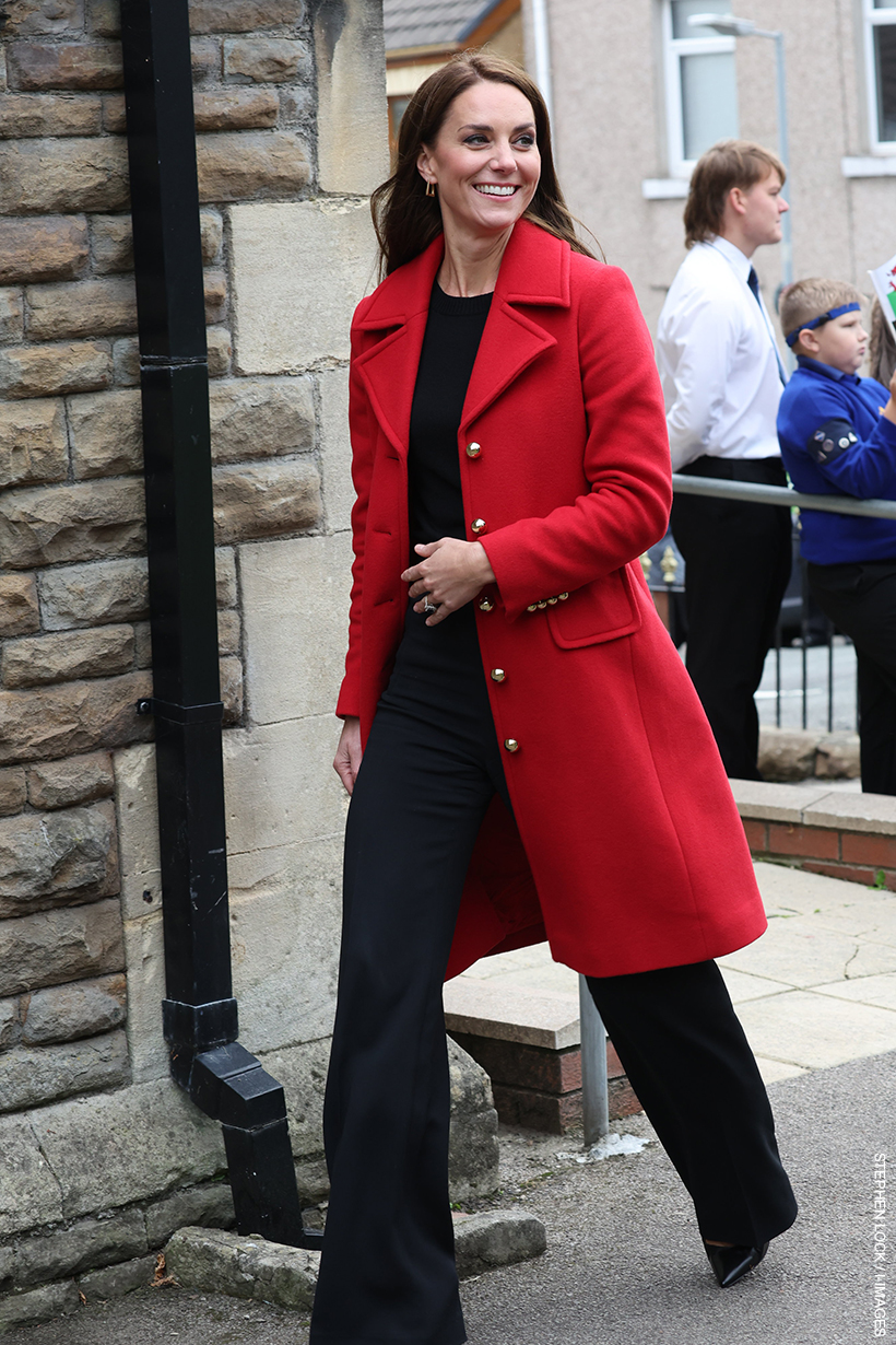 Kate Middleton visiting Wales wearing a red coat on the 27th of September 2022