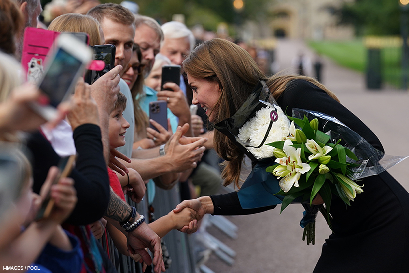 Kate Middleton talks to the waiting crowds outside of Windsor Castle
