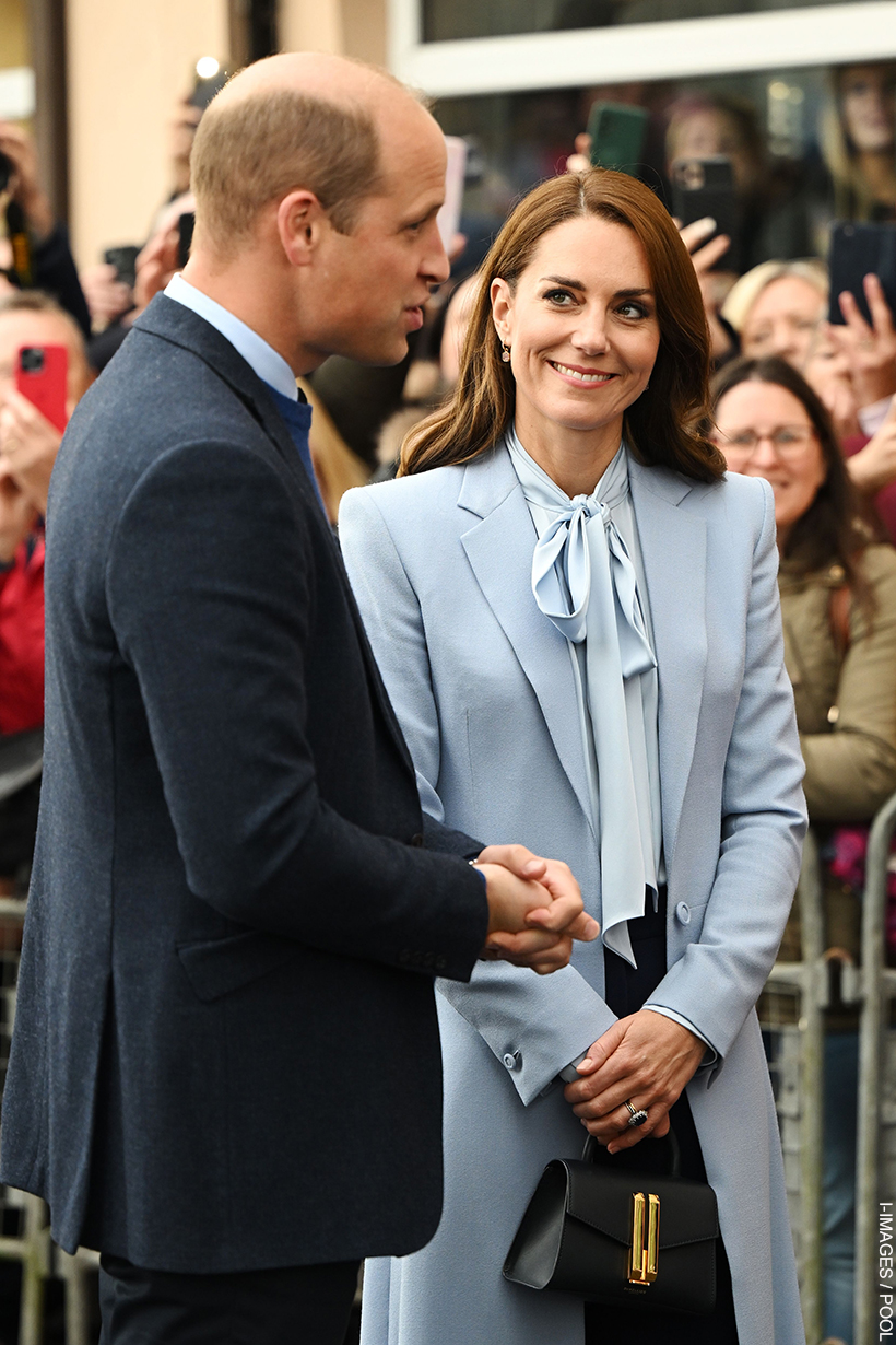 Kate Middleton in Northern Ireland carrying the DeMellier Nano Montreal Bag in Navy Blue