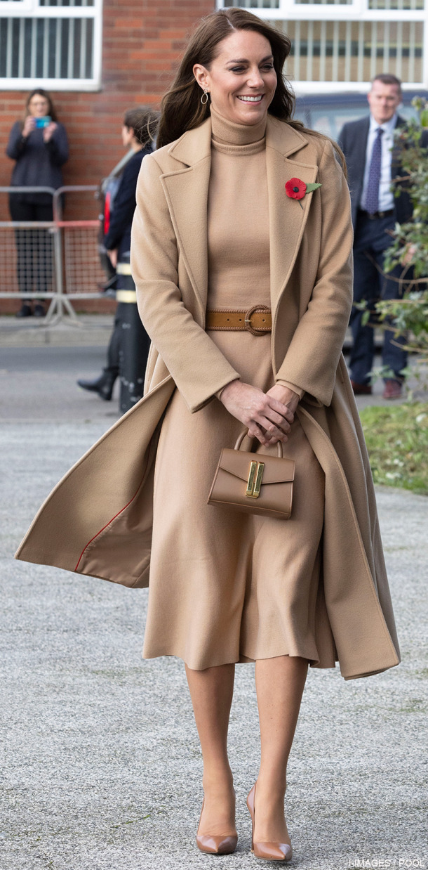 Kate Middleton visiting Scarborough on the 3rd of November 2022 wearing a camel coat, camel skirt and top and matching brown belt and shoes. She carried a toffee-coloured bag by DeMellier London