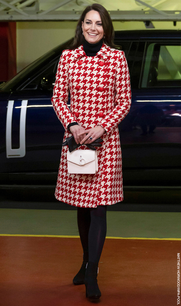 Here, the Princess paired her white bag with a red and white houndstooth coat