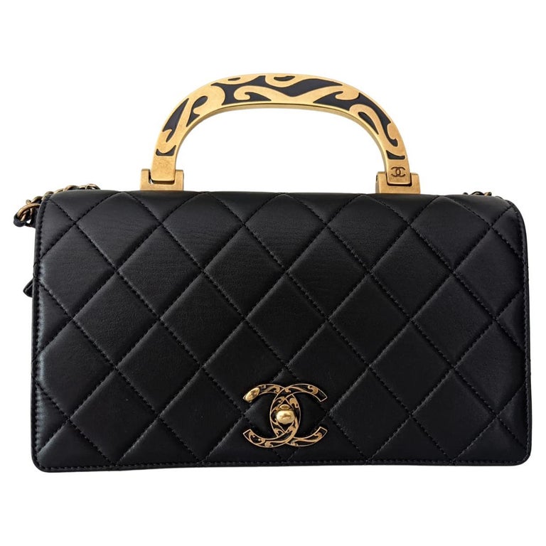Black Chanel bag with enamel handle
