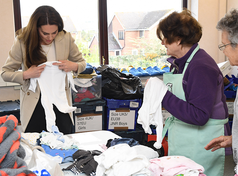 Kate Middleton visits Windsor Baby Bank in beige blazer & flats