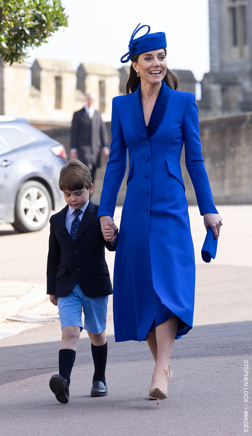 Kate Middleton walking to the chapel with her son Louis.  The Princess wore a bold blue outfit for the 2023 Easter Sunday service.