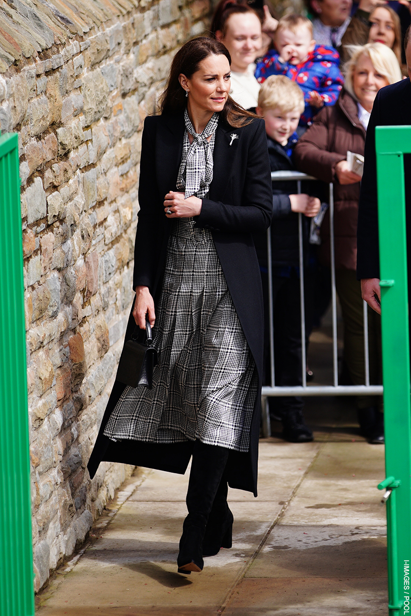 Kate Middleton in black for Aberfan; Adorable baby swipes her bag!