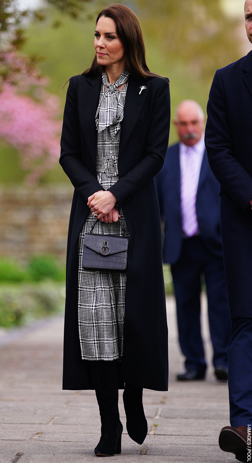 Kate Middleton in black for Aberfan; Adorable baby swipes her bag!