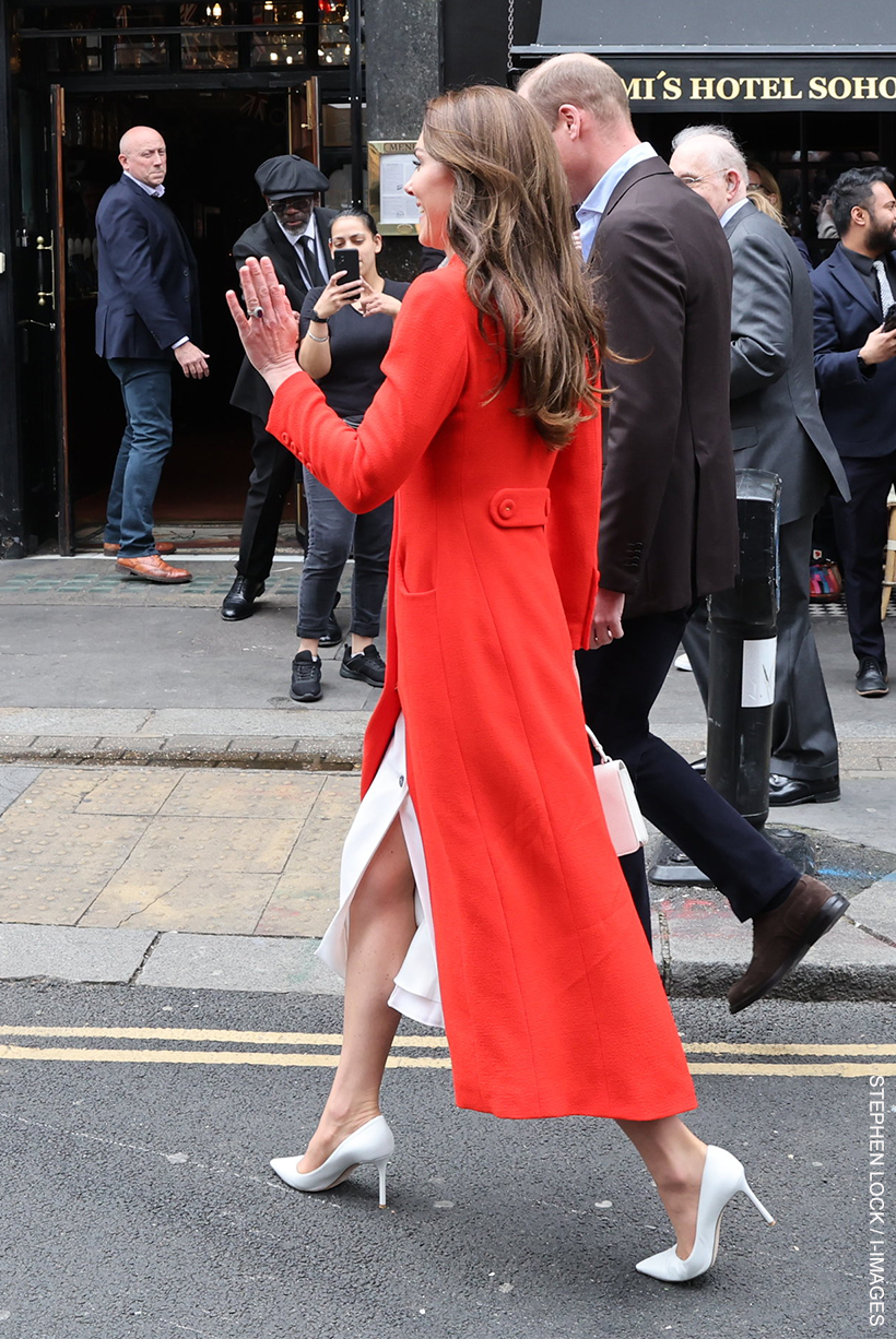 Kate Middleton in Soho.  She's wearing her white Jimmy Choo pumps. 