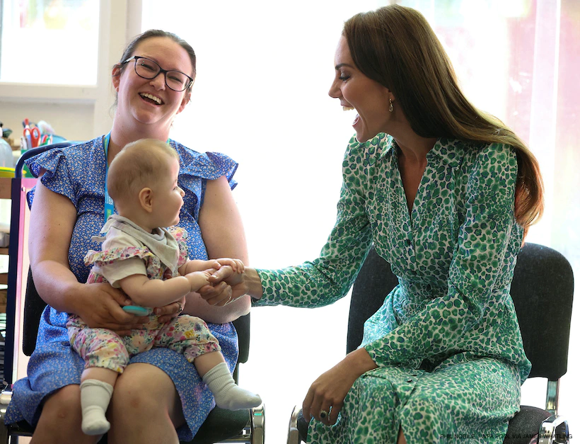 Kate Middleton wears green leopard print dress for Nuneaton visit Kate Middleton wears green leopard print dress for Nuneaton visit
