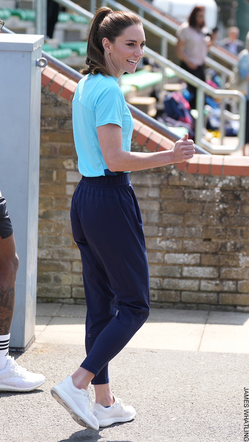 Kate Middleton wearing the Lululemon Chargefeel workout shoe in white at a different rugby event over the summer.  She is also dressed in sportswear on this occasion.