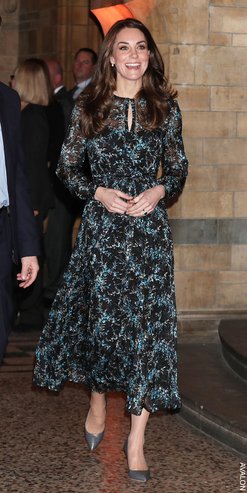 Kate Middleton in a dark floral midi dress at an engagement at the Natural History Museum in 2016.