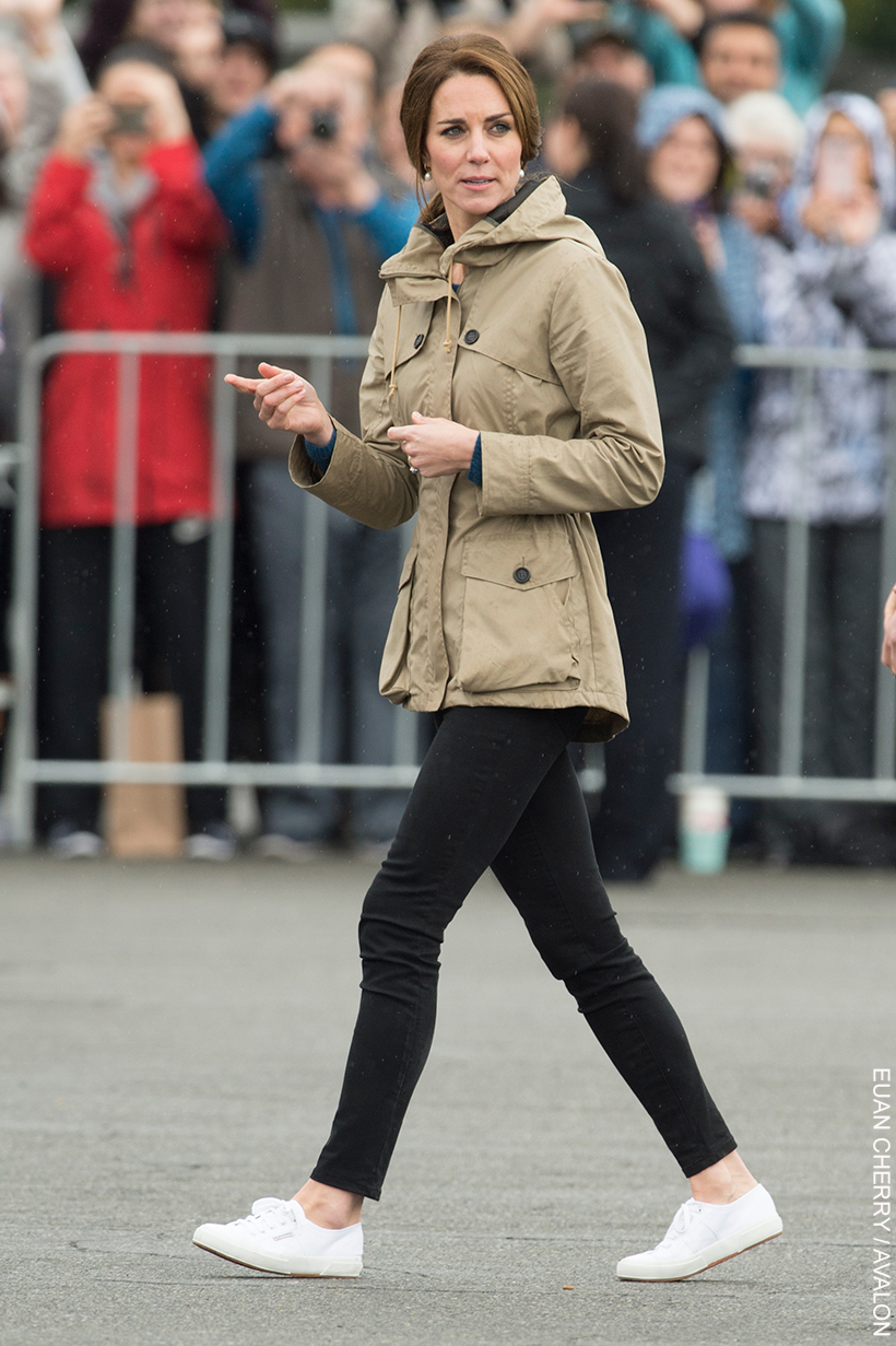 During a visit to Canada in the Autumn of 2016, Kate Middleton wore this casual outfit during a sailing engagement.  The outfit is a wax parka, black skinny jeans, white sneakers and simple pearl earrings.