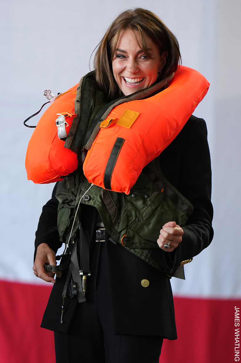 Kate laughing now the life jacket she's wearing around her neck has inflated.