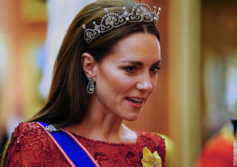 Kate Middleton wearing the Lotus Flower tiara, chandelier earrings and red dress with crystal details at the 2022 Diplomatic Corps Reception.