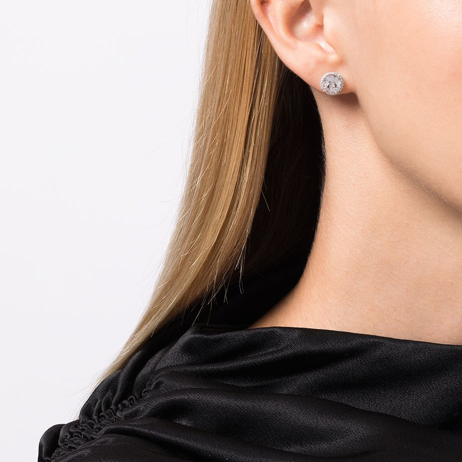 Model wearing the white topaz and diamond stud earrings.