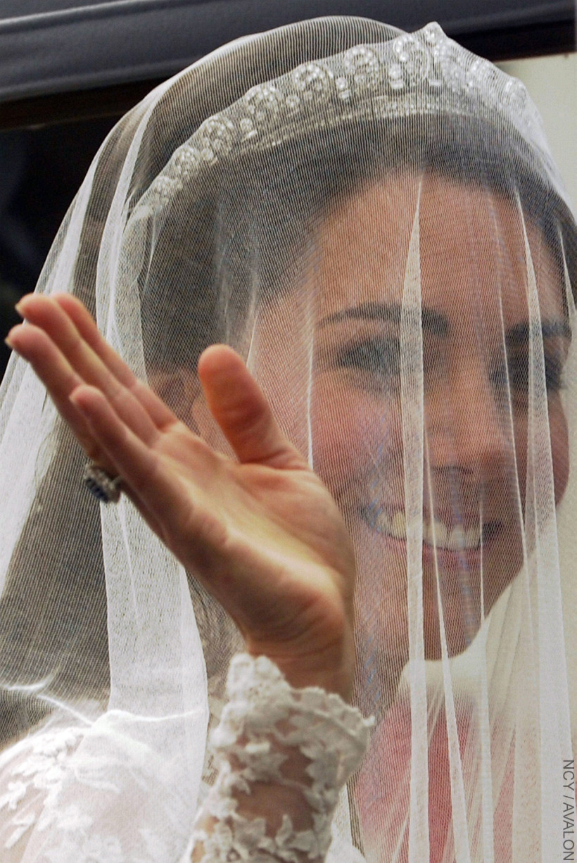 Kate Middleton on her wedding day, wearing the Cartier Halo Tiara, covered by her veil 