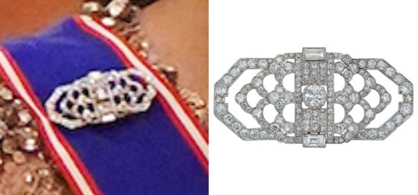 Kate Middleton wearing an Art Deco brooch, used to pin her Royal Victorian Order sash to her gown.  Next to the photo, there's a picture of the brooch from Bentley and Skinner's online catalogue. 