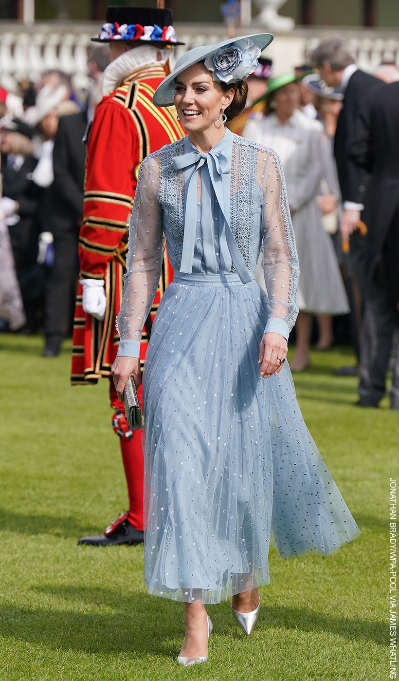 The Princess of Wales wearing the same outfit as above, at a garden party in 2023. 