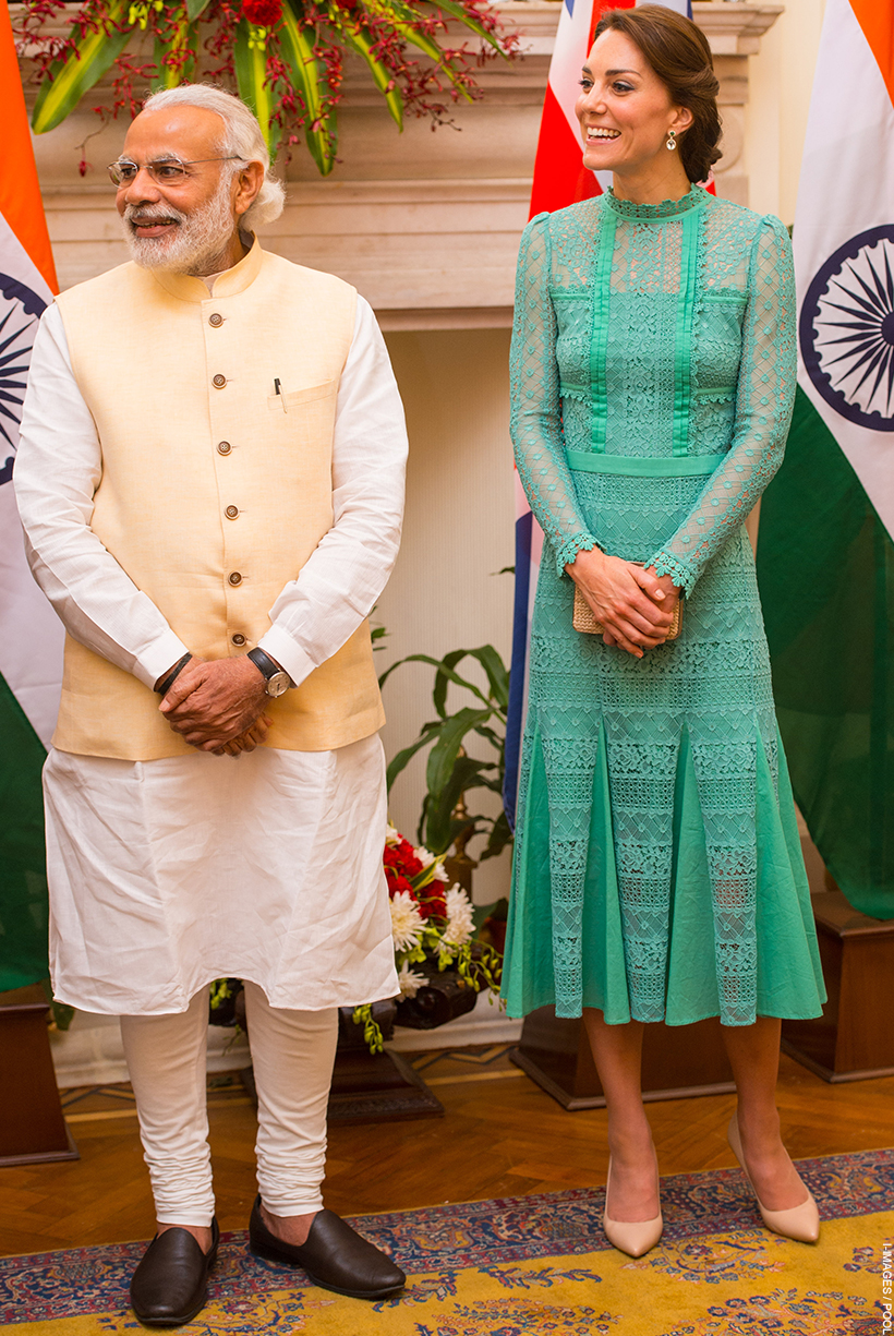 The Princess of Wales looks regal and sophisticated in a teal lace number with nude shoes. She is stood with the Indian PM