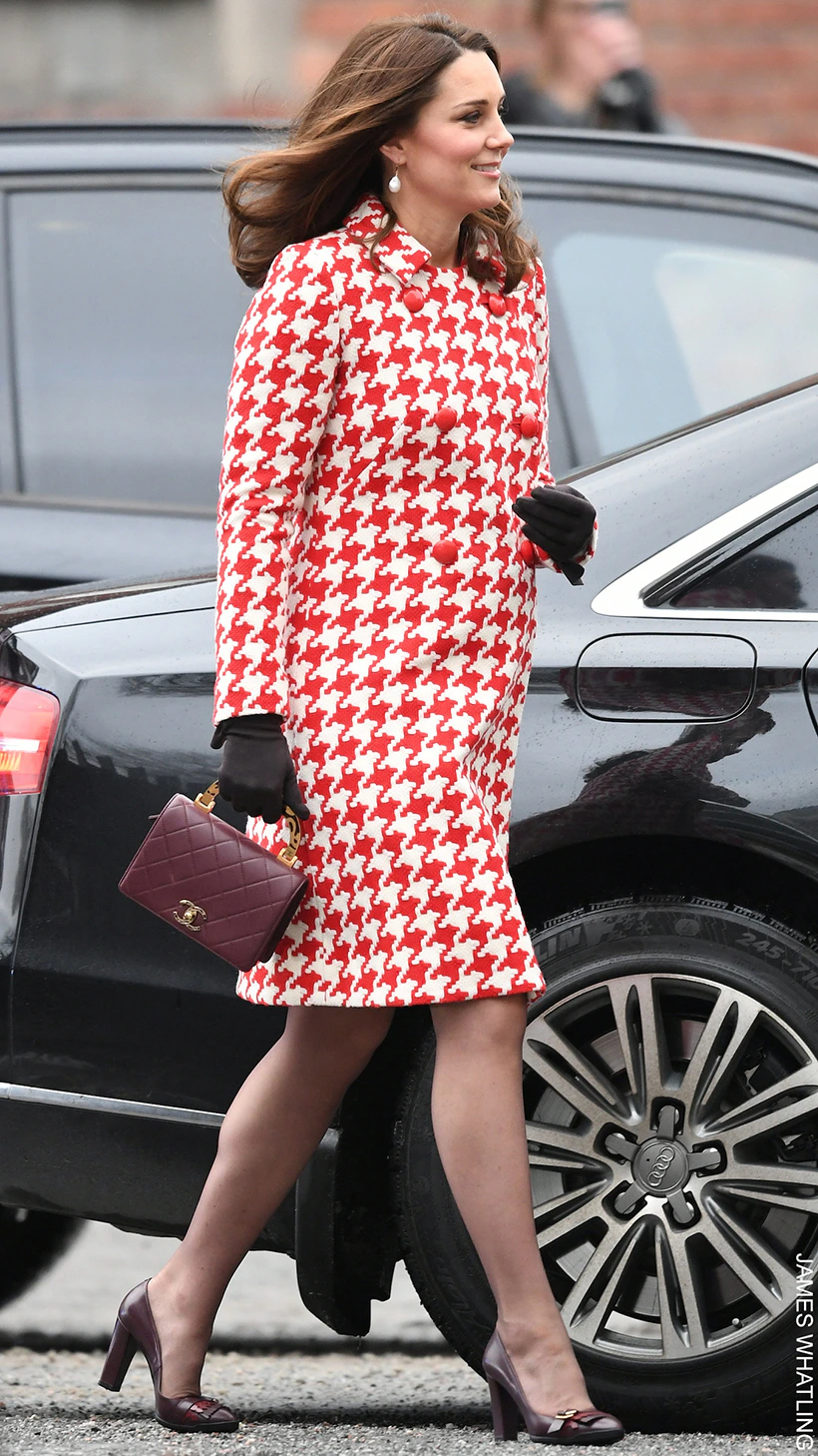 9 times Kate Middleton altered & upcycled her outfits 17 Kate Middleton, 6-7 months pregnant with Prince Louis during her visit to Stockholm, Sweden in 2018, wearing a red and white houndstooth coat by Catherine Walker & Co, paired with black gloves, a maroon handbag, and maroon heels.