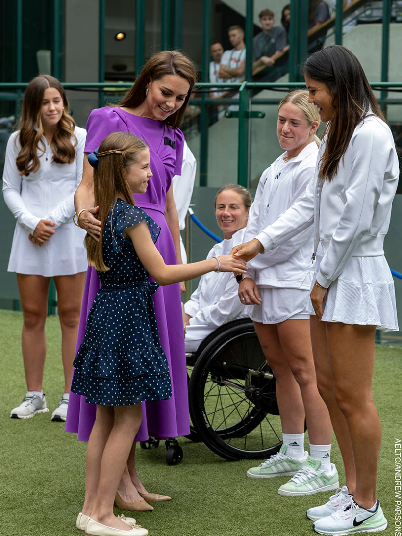 Princess Charlotte shakes hands with Emma Raducanu 