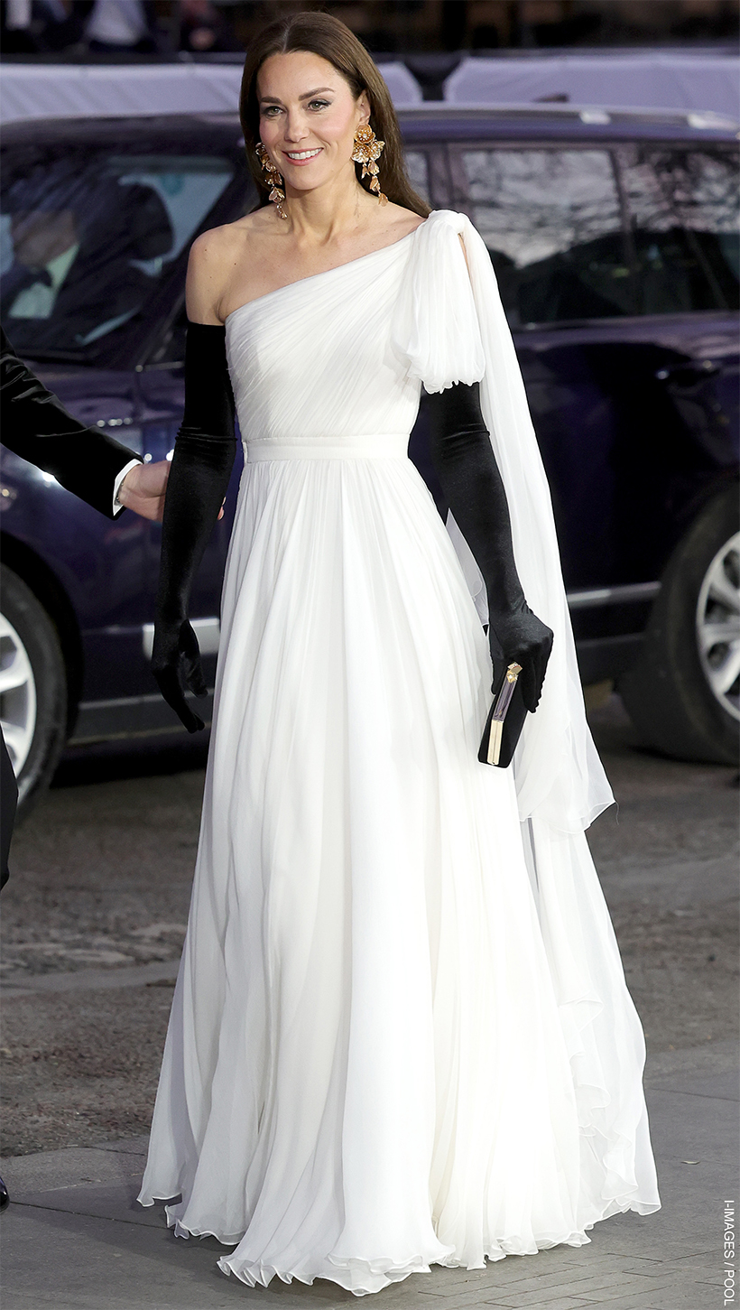 The Princess of Wales wears a white dress and black gloves