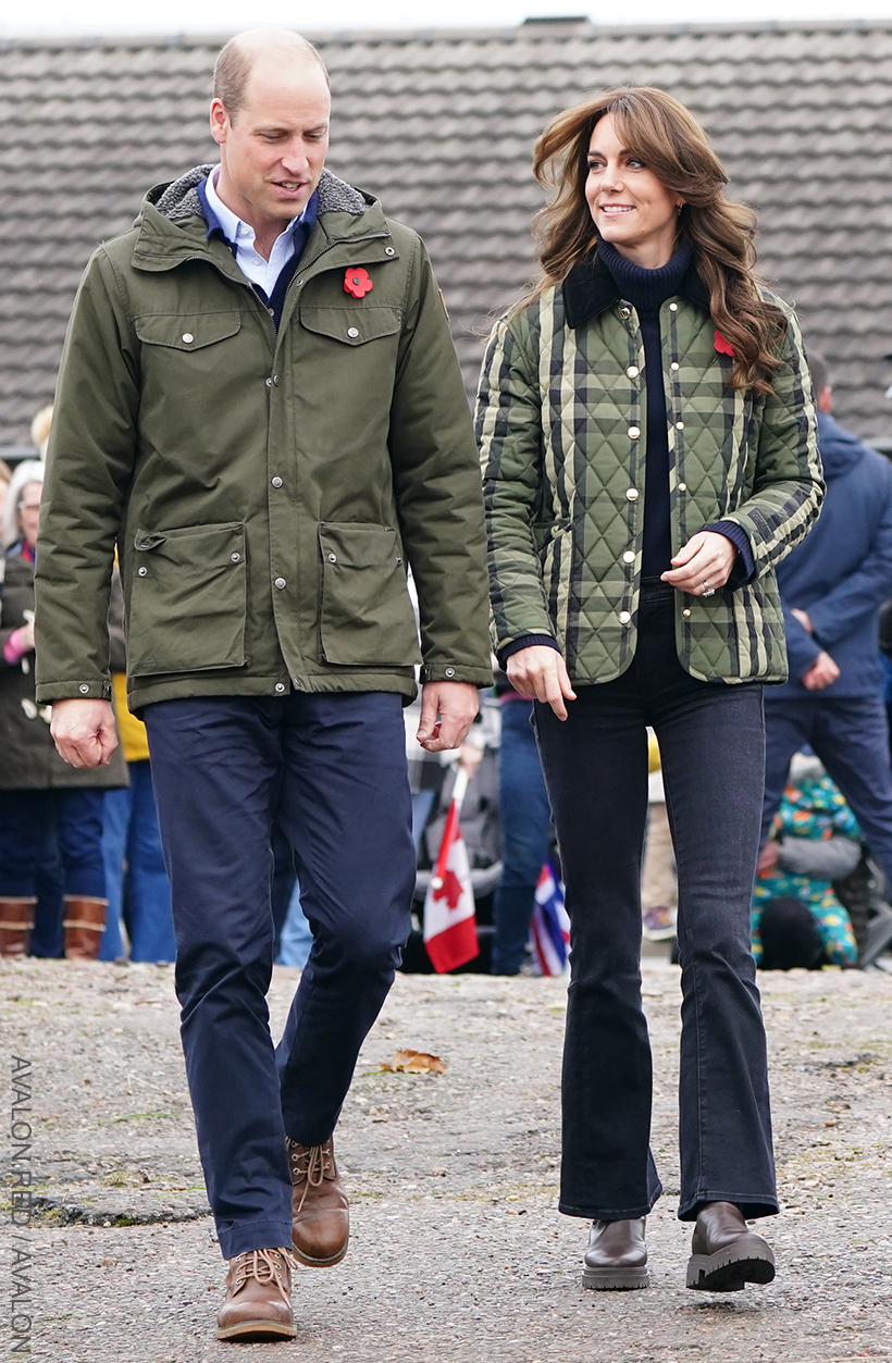 Kate Middleton wears blue flared jeans, brown boots and plaid jacket