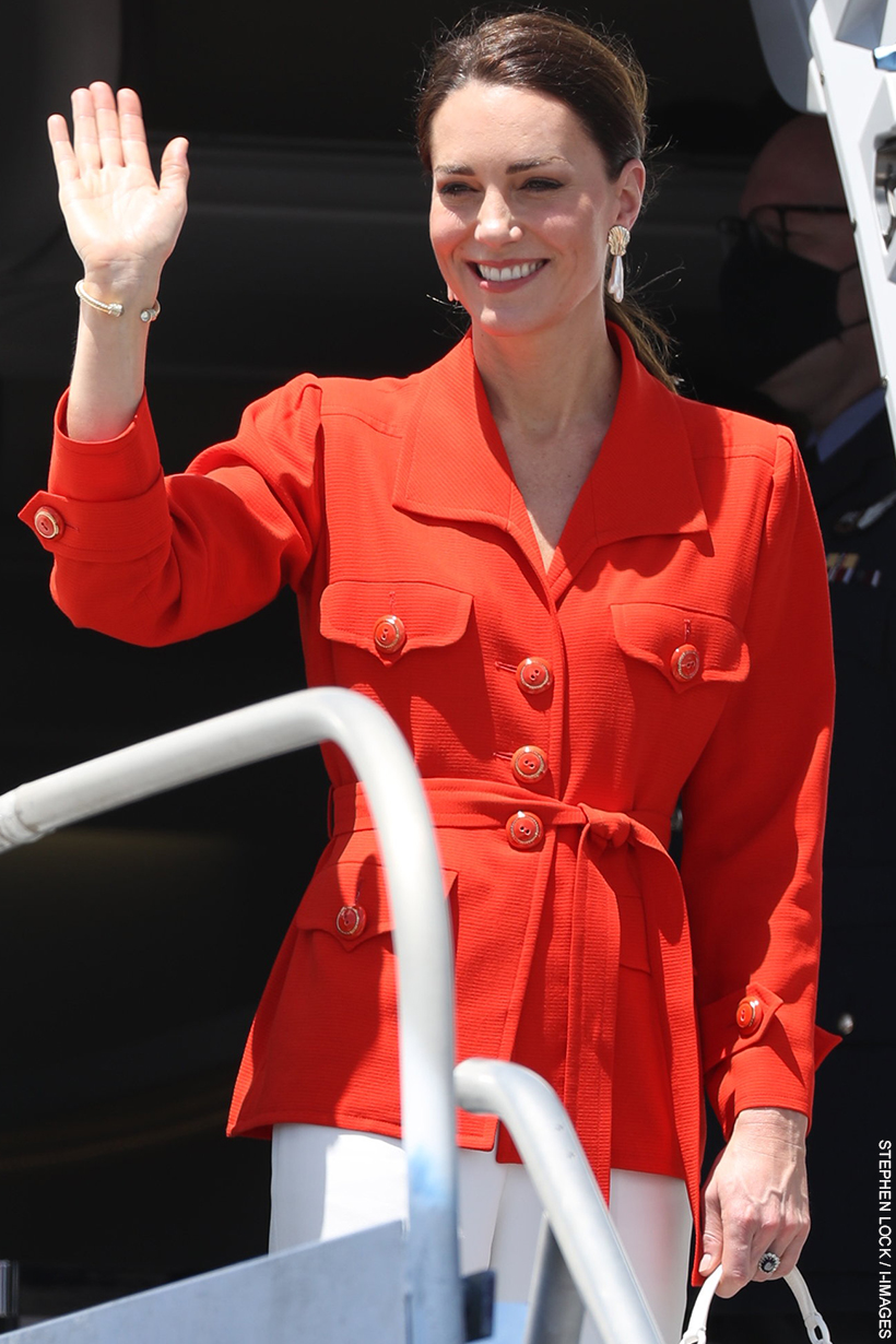 The Princess of Wales waves as she boards a flight out of Jamaica during an overseas visit 