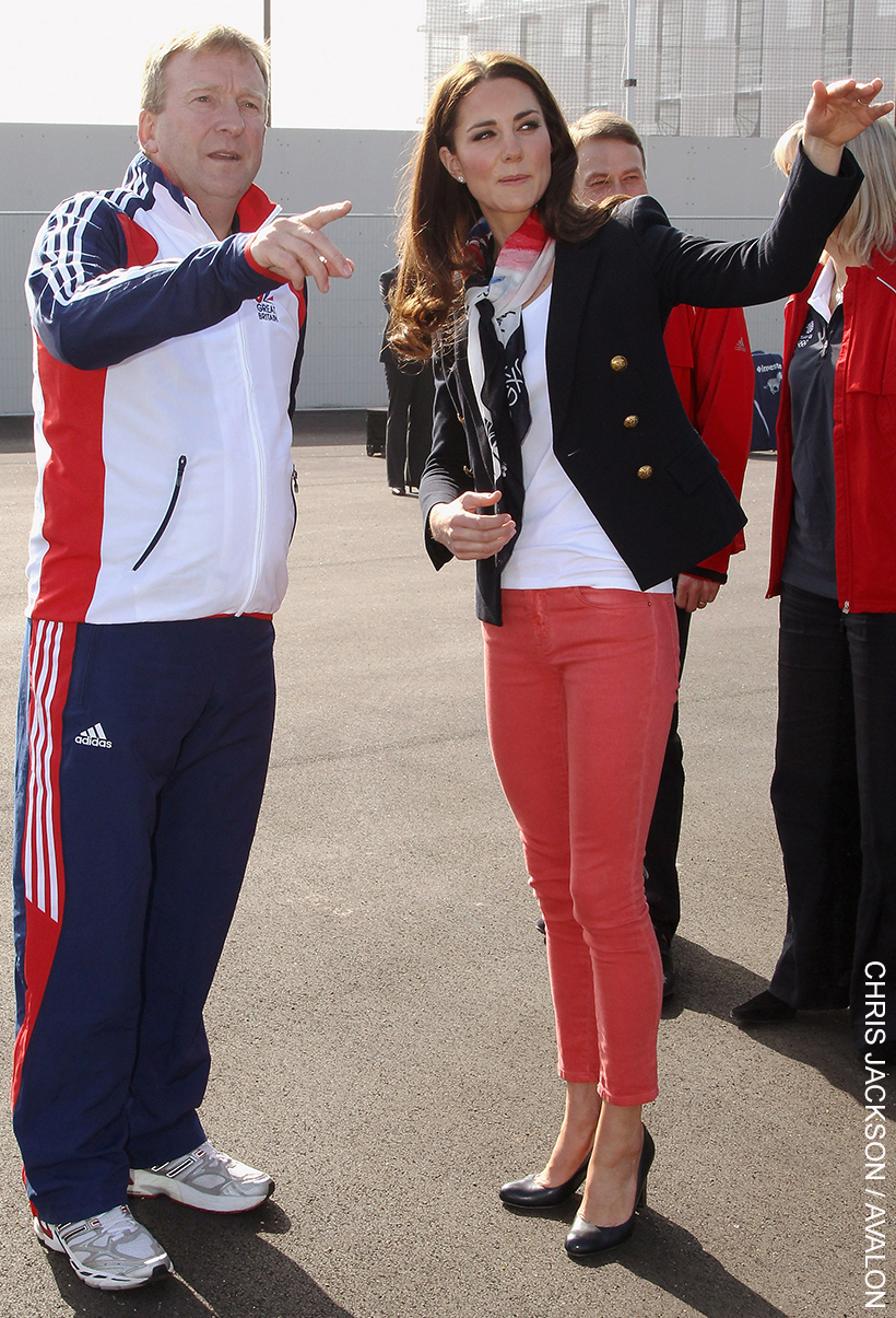 Kate Middleton paired pink skinny jeans with navy heels, a navy blazer, a simple white T-shirt and a scarf at Team GB's Olympic Games. The princess style reflects the business casual style