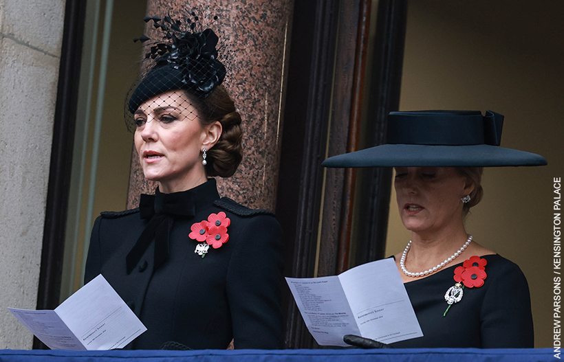 The Princess of Wales and the Duchess of Edinburgh standing on the Foreign Office balcony on Remembrance Sunday singing hymns