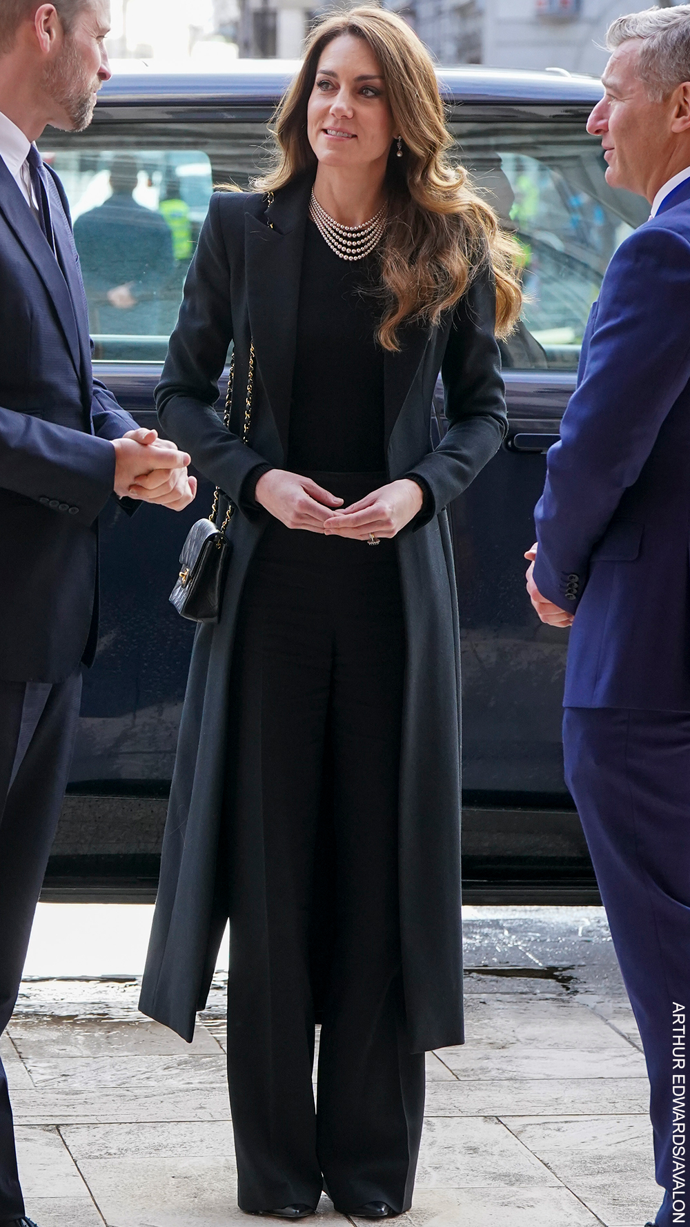 Princess of Wales in sombre black and pearls as she hugs Holocaust survivors at memorial service