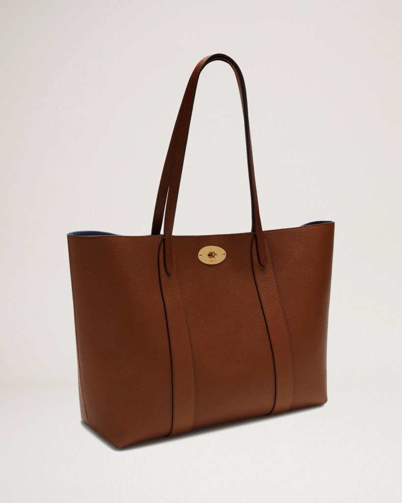 A side-angle shot of the Mulberry Bayswater Tote, emphasizing its structured form and premium leather texture.