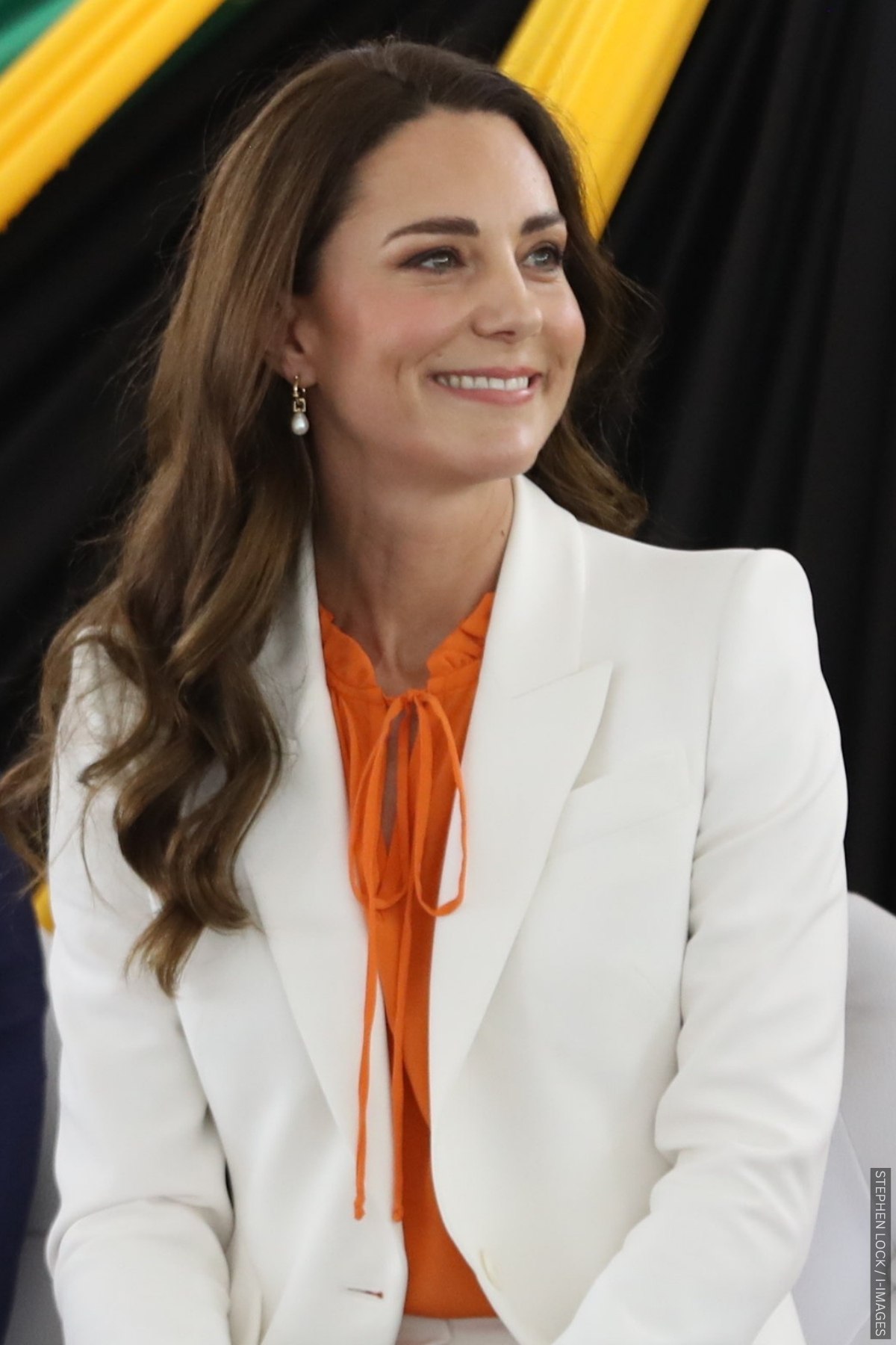 The Princess of Wales wearing white and orange together