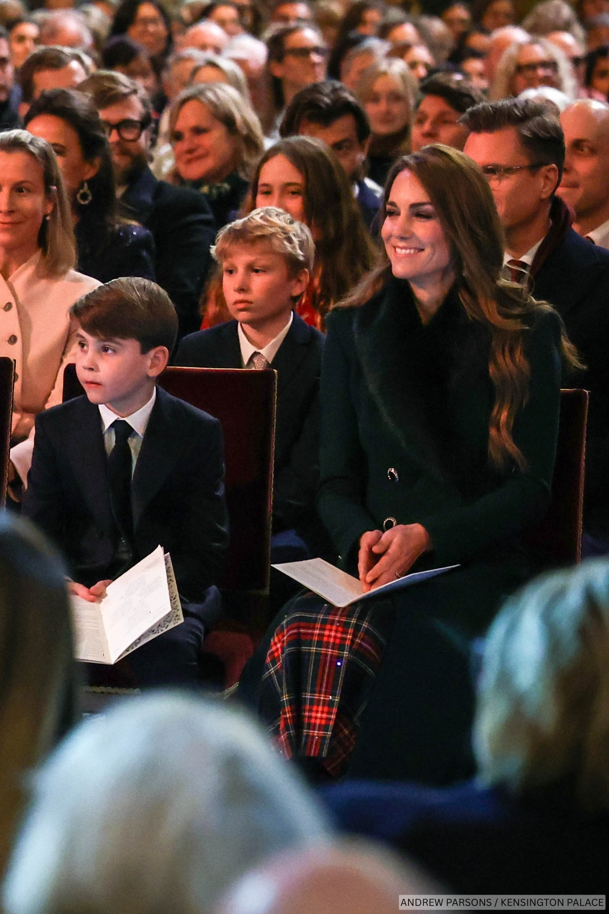 The Princess of Wales wears green and tartan to her Christmas carol concert.