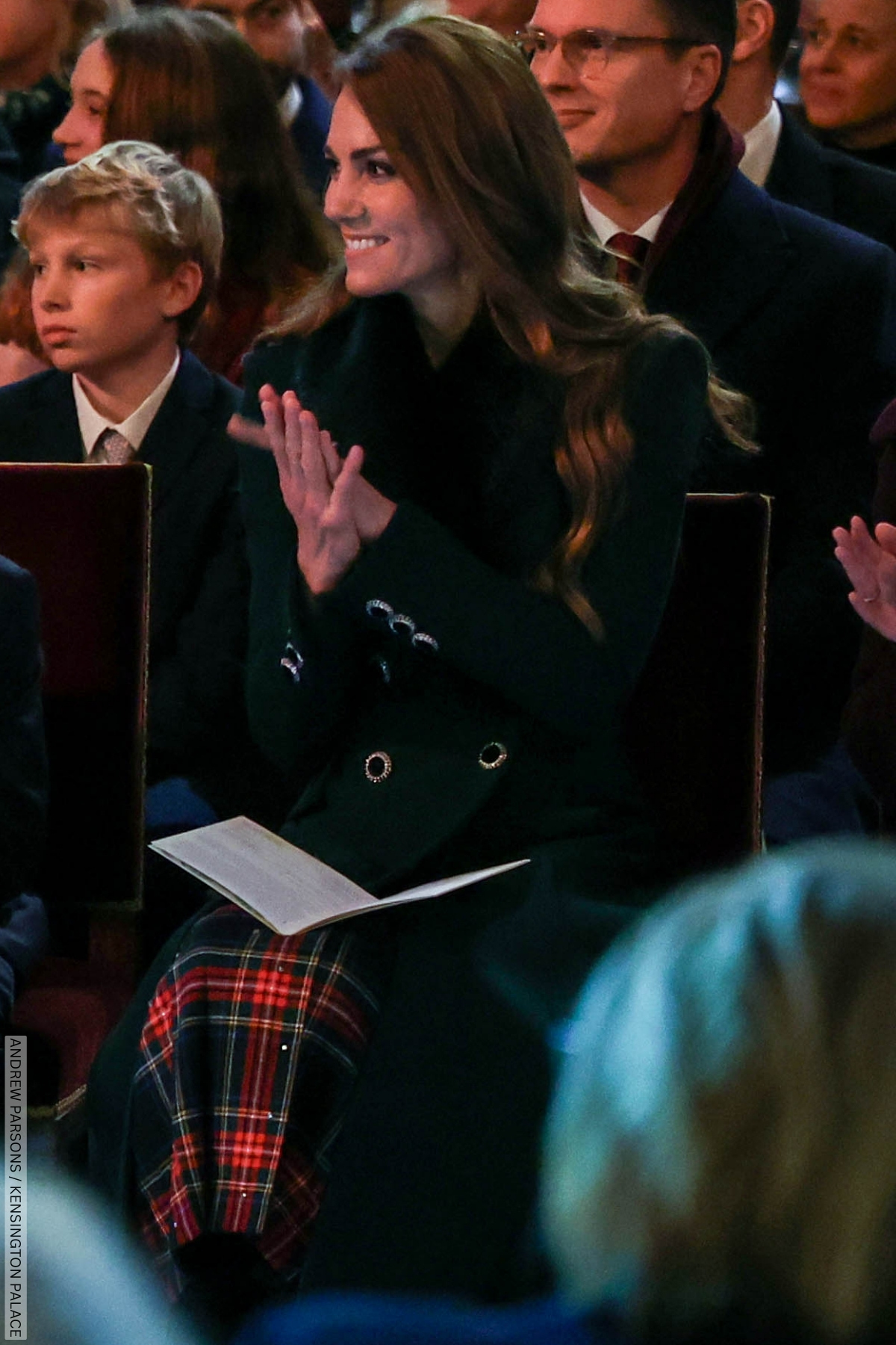 The Princess of Wales sat in the audience of her 'Together at Christmas' carol concert wearing a red tartan skirt