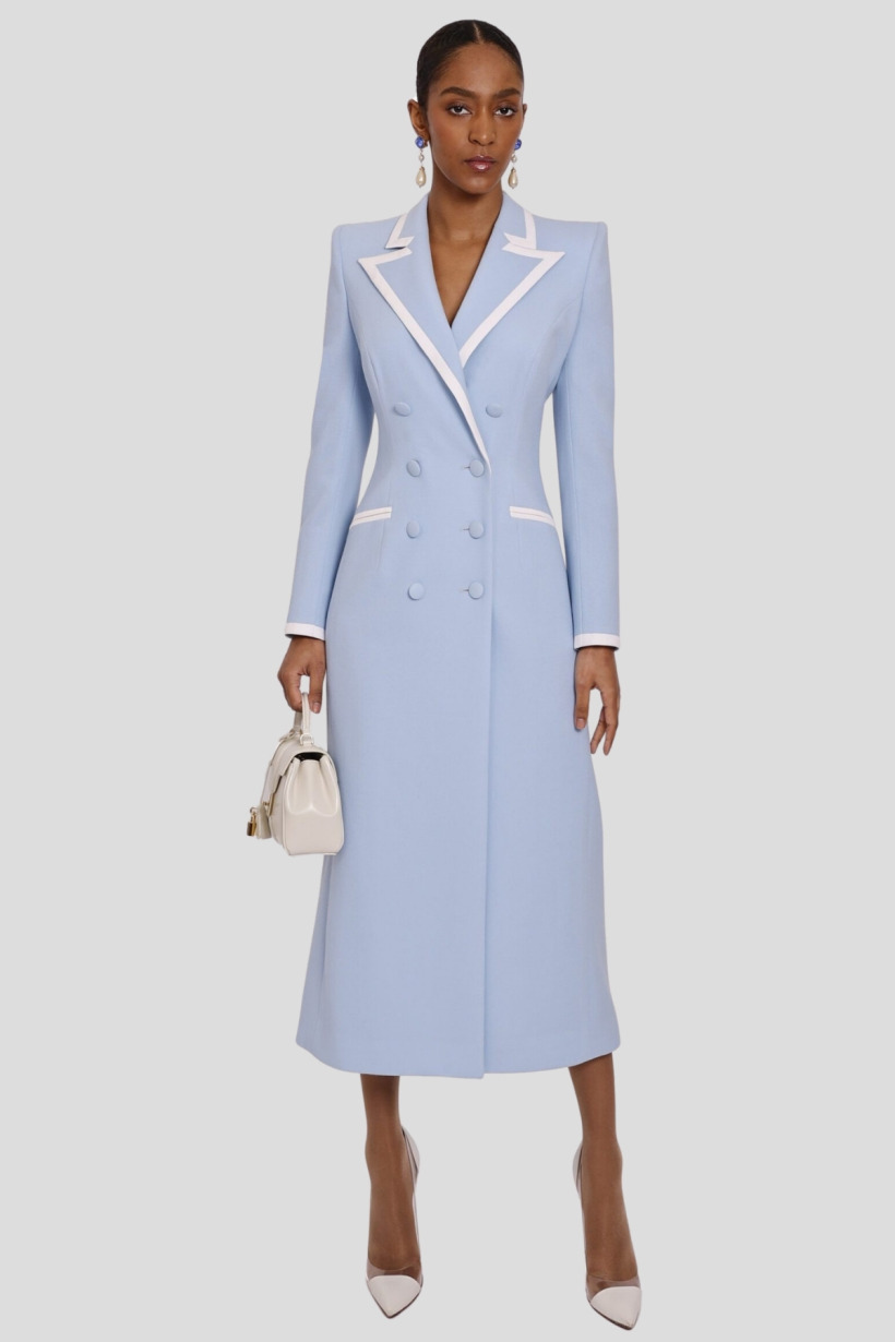 The powder blue Catherine Walker Lafayette coatdress, with double-breasted buttons, structured shoulders and white trim