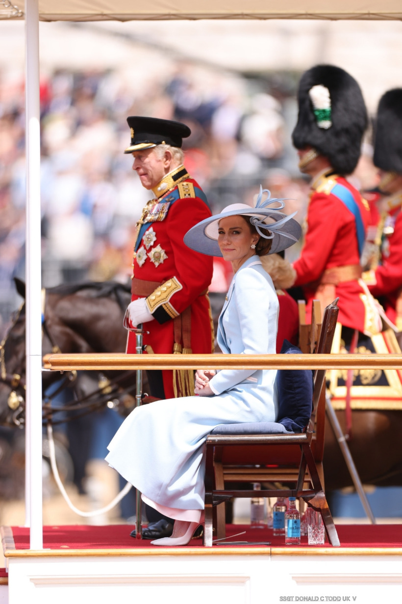 The Princess of Wales in her powder blue coatdress watches the parade at Horse Guards Parade