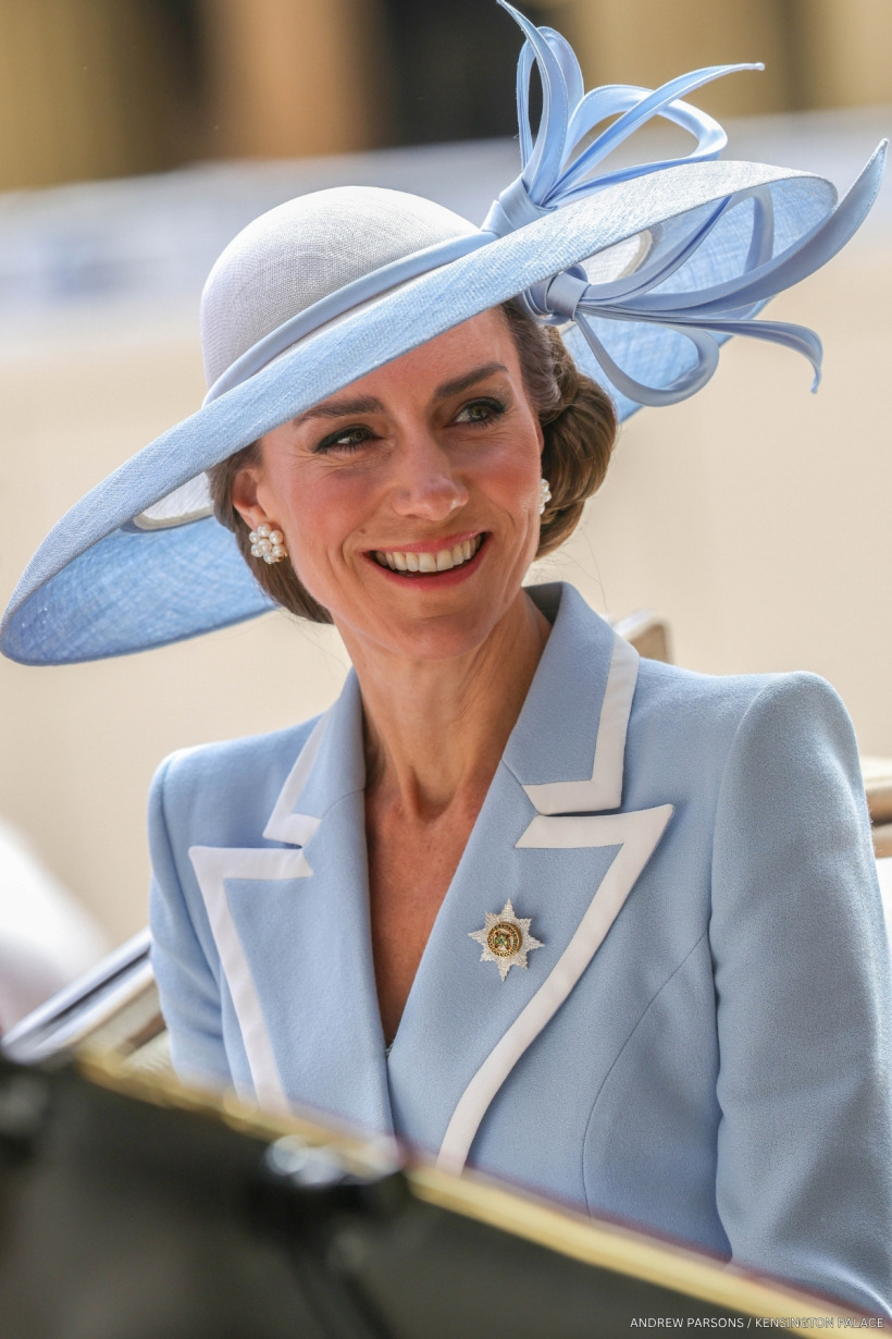 The Princess of Wales smiles in a powder blue Catherine Walker coatdress and matching Philip Treacy hat at Trooping the Colour 2026