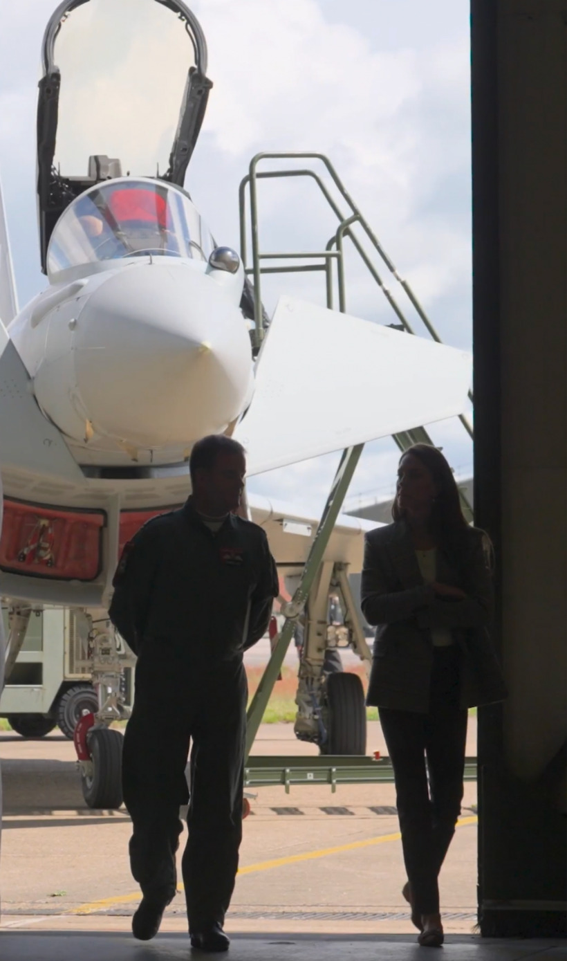 Kate Middleton in silhouette with a plane in the background, during the Armed Forces Day visit to RAF Coningsby