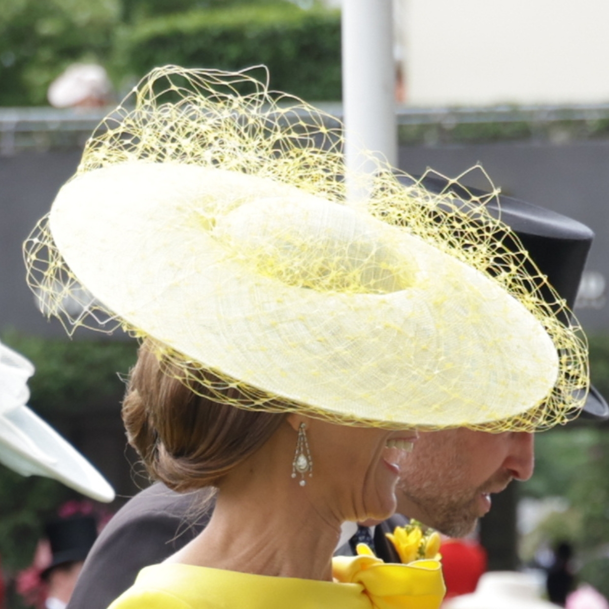 Kate Middleton wearing a yellow Jane Taylor 'Epona' hat with veiling at Royal Ascot 2026