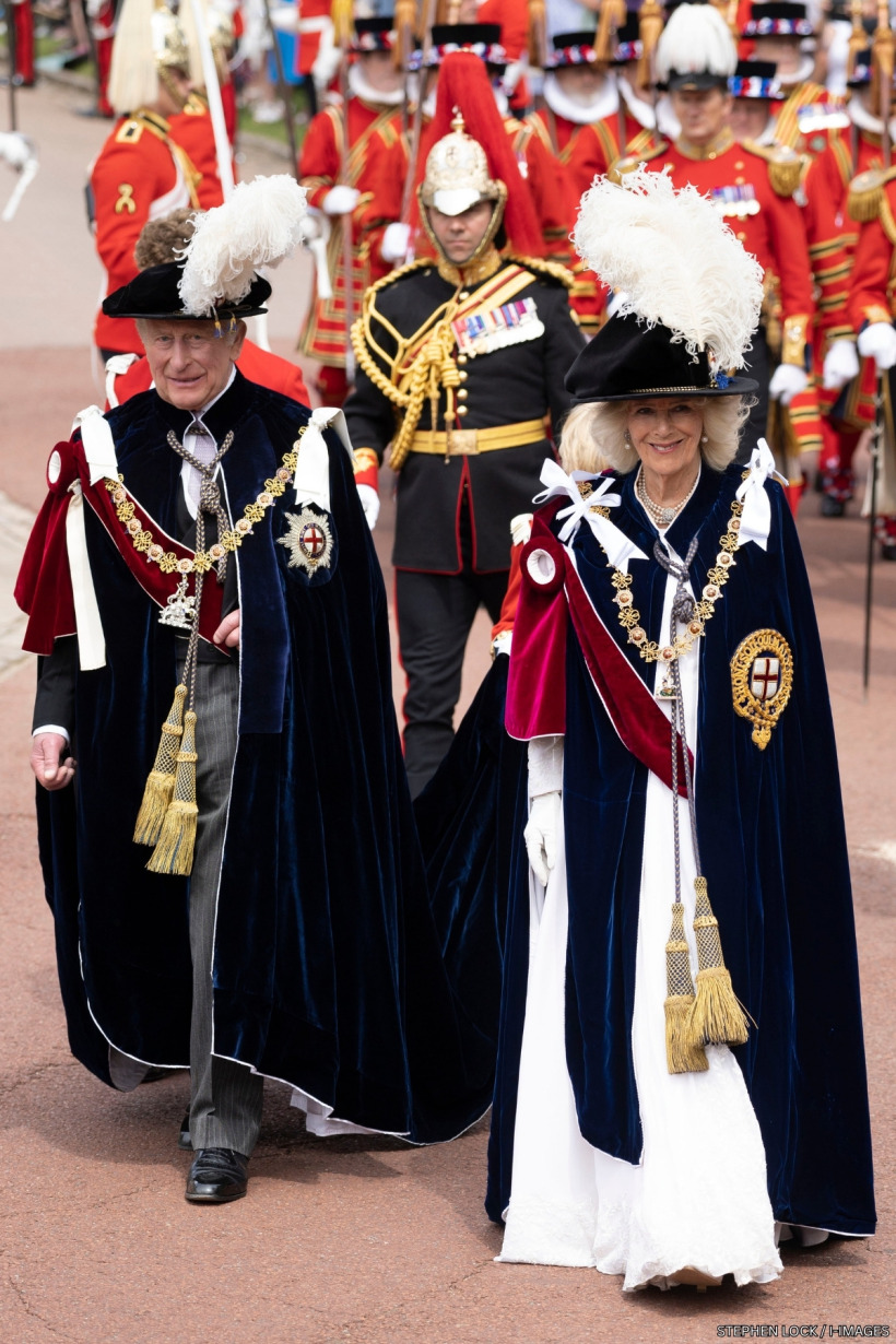 King Charles and Queen Camilla in their Order of the Garter robes and plumed hats during the Garter Day procession