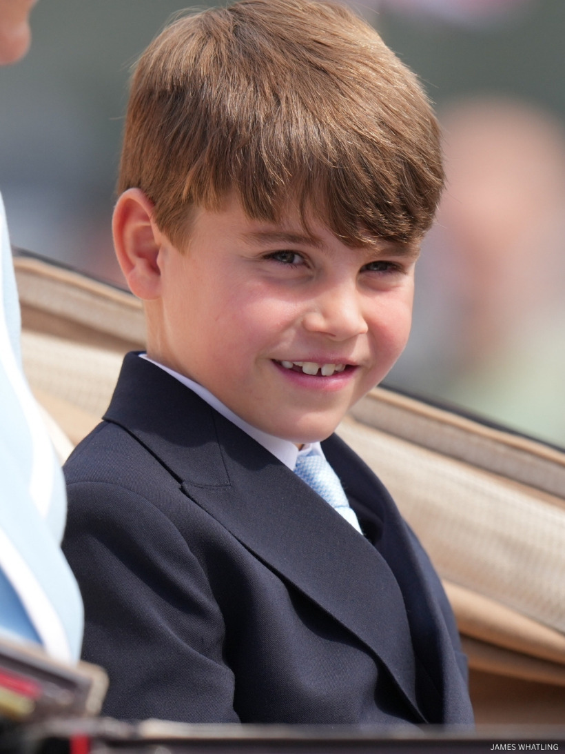 Prince Louis looks out from the carriage during the Trooping the Colour procession