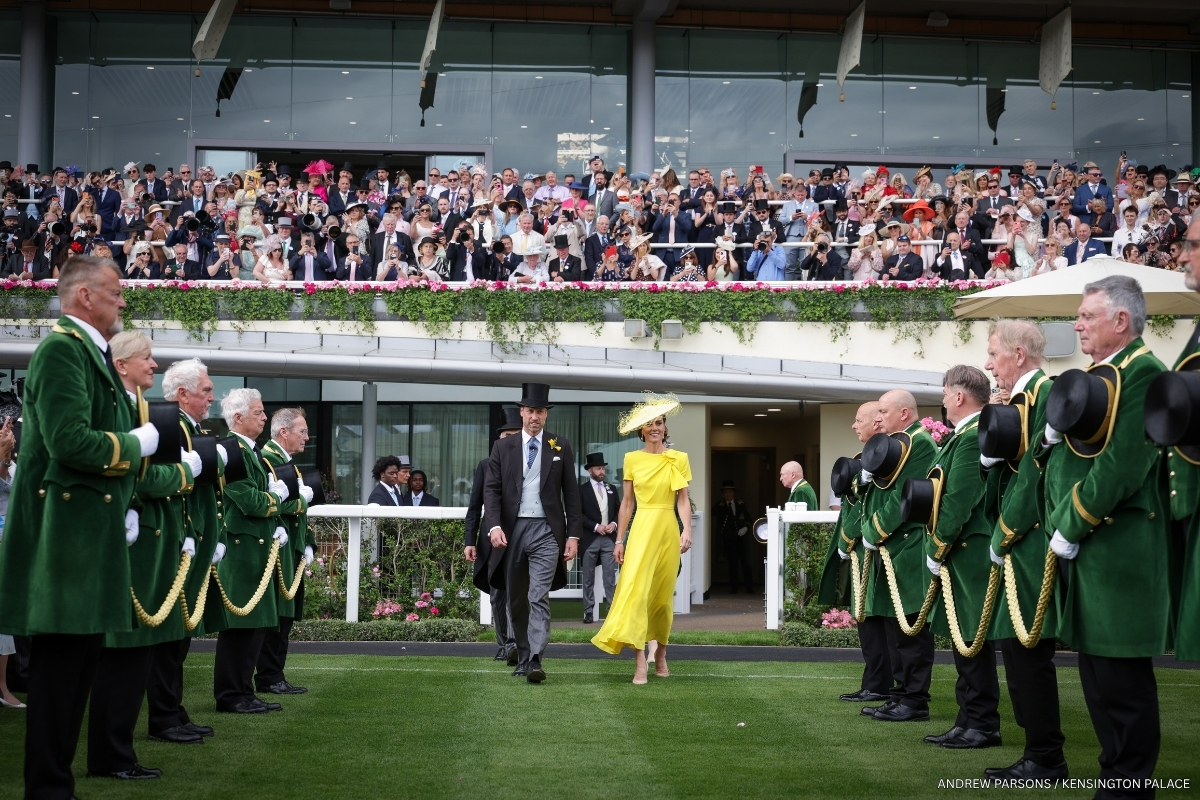 The Prince and Princess of Wales walk on the racecourse to present presenting the trophies for the Prince of Wales's Stakes at Royal Ascot