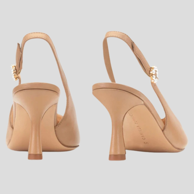 Close-up of the Camilla Elphick 'Lucia' slingback's angular kitten heel and signature pearl buckle