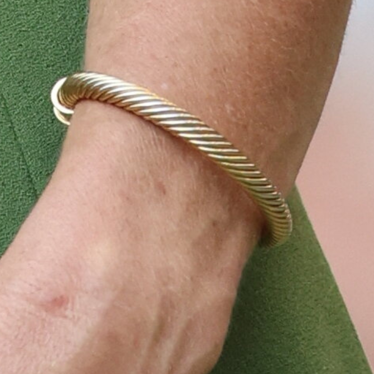 Kate Middleton wearing the gold Halcyon Days Maya Torque bangle at Wimbledon