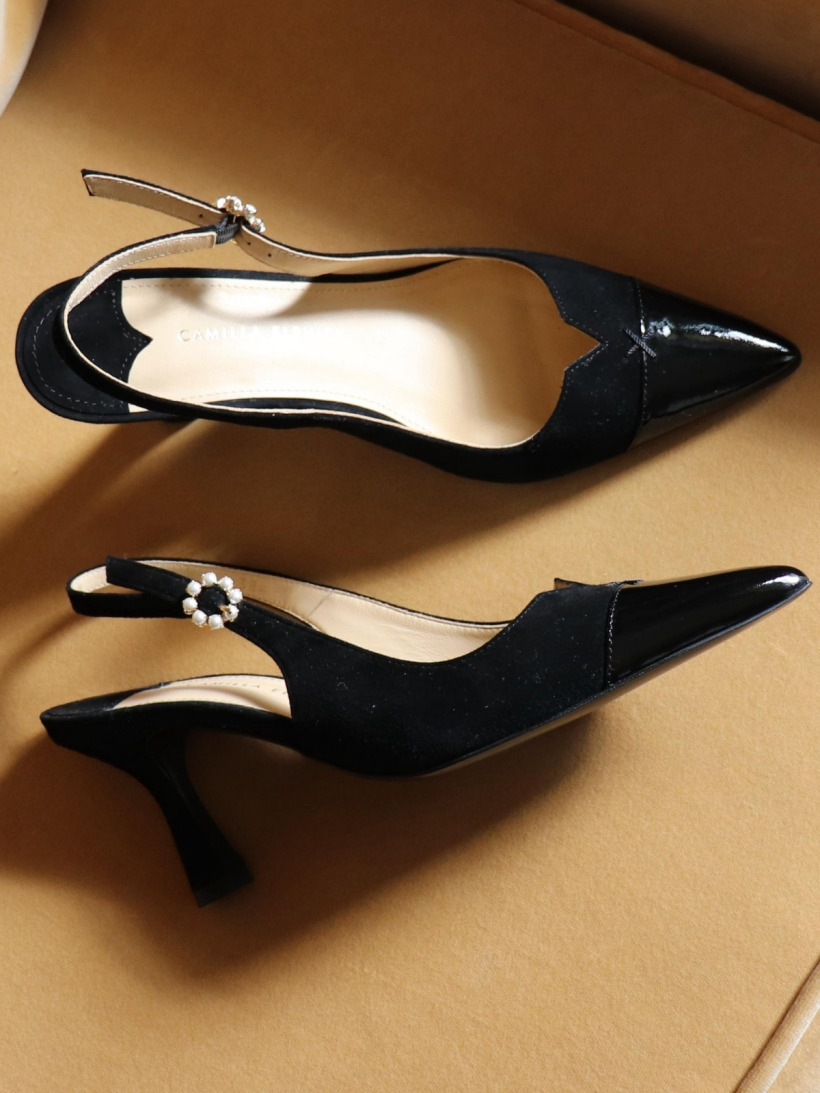 The Camilla Elphick 'Lucia' black slingback pumps with patent pointed toe, kitten heel and pearl buckle detail
