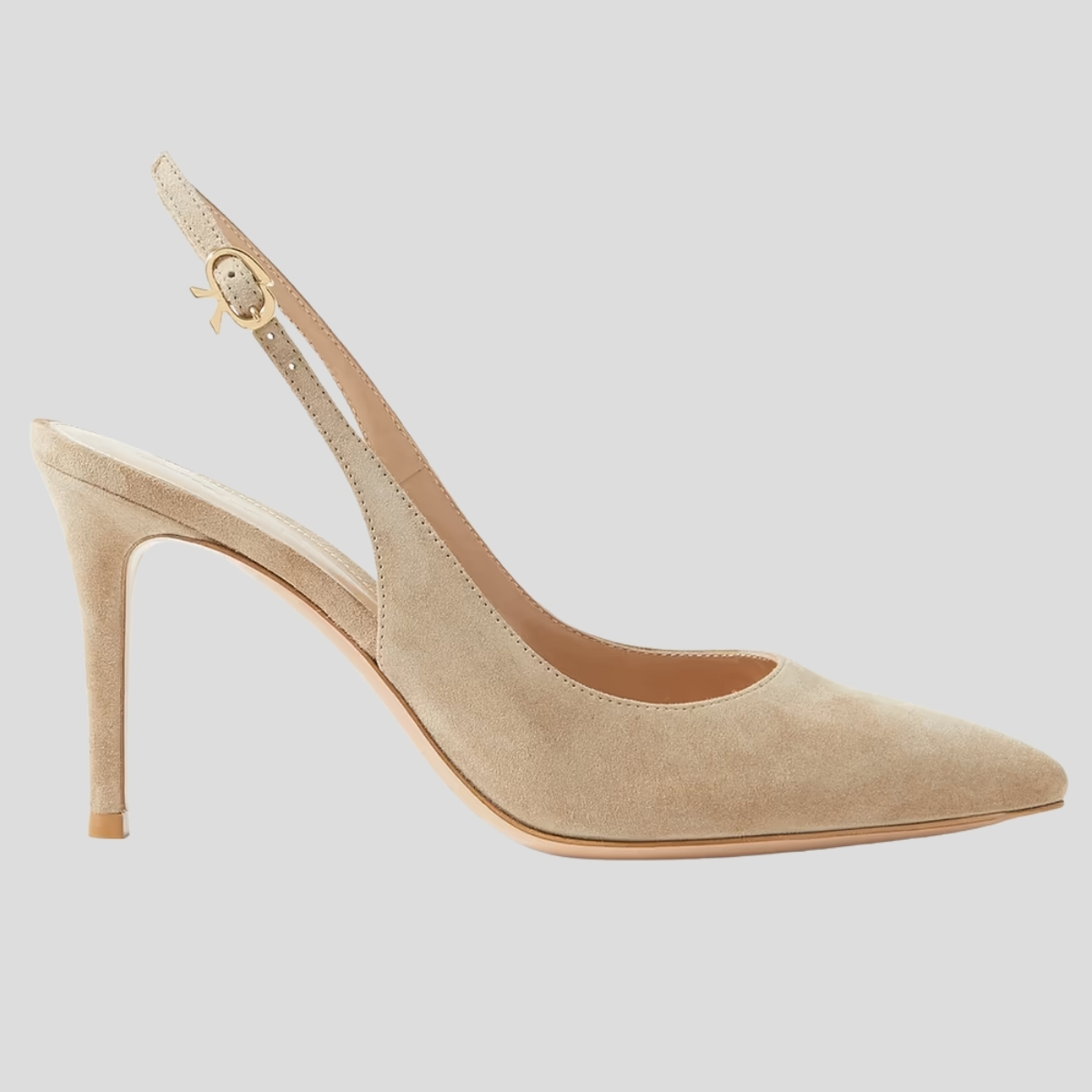 The Gianvito Rossi 'Ribbon 85' slingback pumps with a gold ribbon-shaped buckle and pointed toe