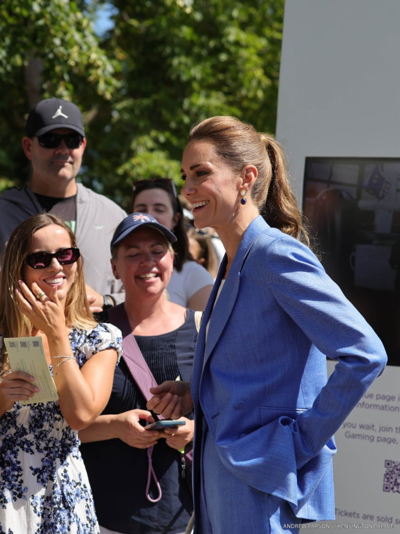 Kate Middleton chatting with tennis fans in The Queue at Wimbledon