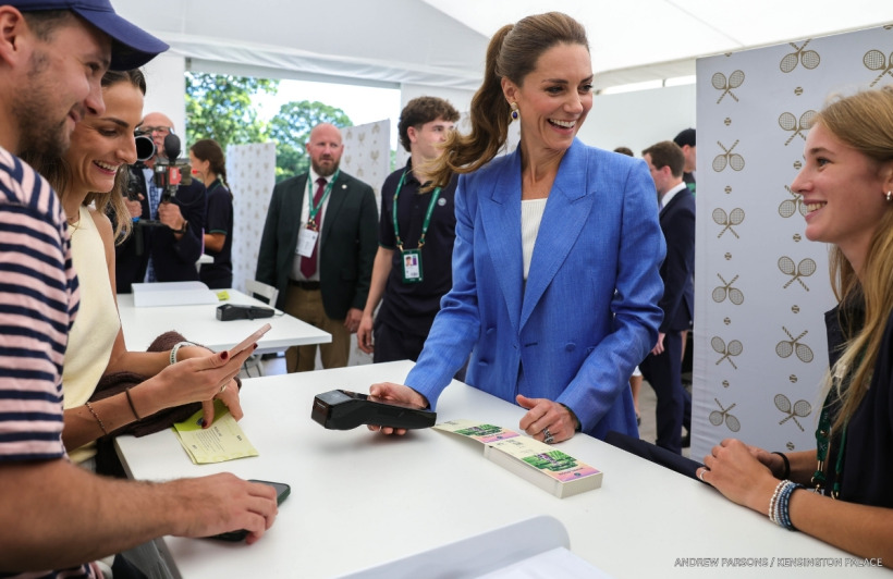 Kate Middleton handing out tickets to fans queuing at Wimbledon