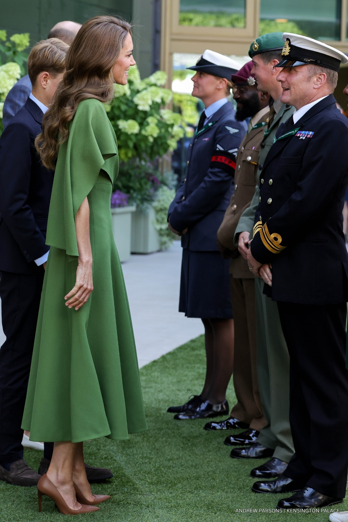 Kate Middleton and her family greeting Wimbledon staff ahead of the final